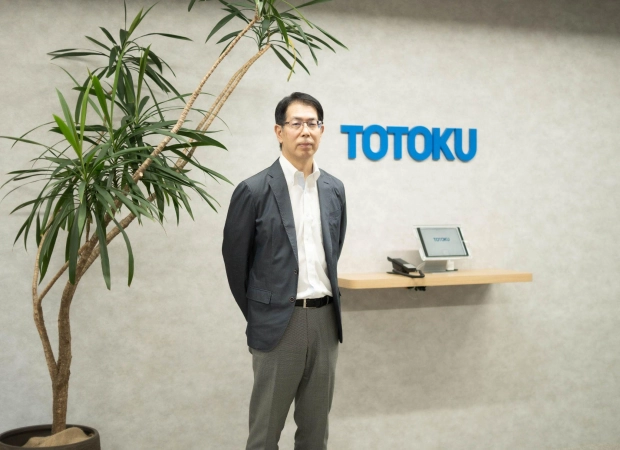 代表取締役社長　牧 謙 氏