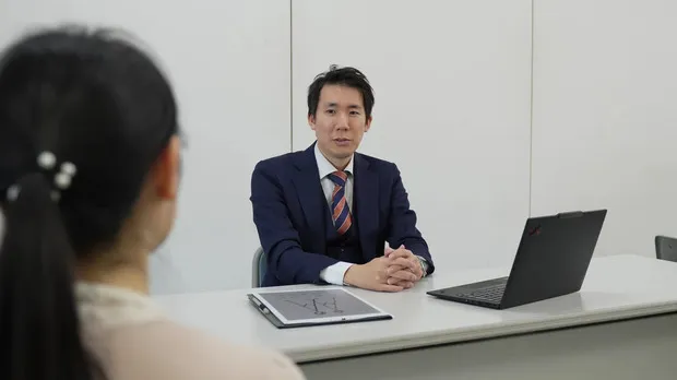 相談にのっている安部コーディネーター