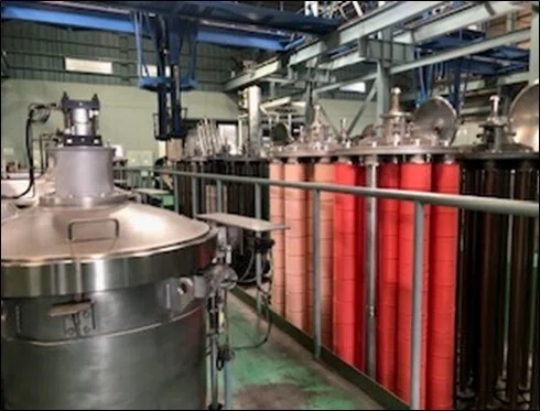 高温水を使用する糸の染色機 生地の染色機と同様、ここで出る排熱を再利用